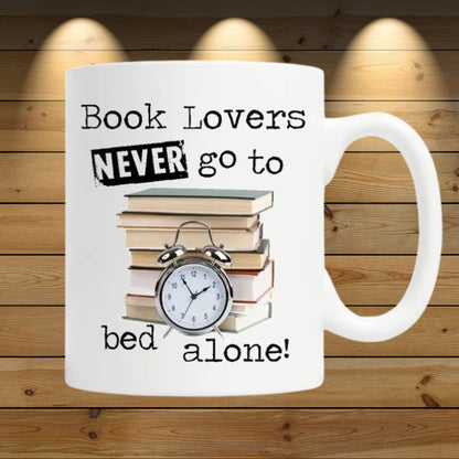 Book Lovers Never Go To Bed Alone Mugs