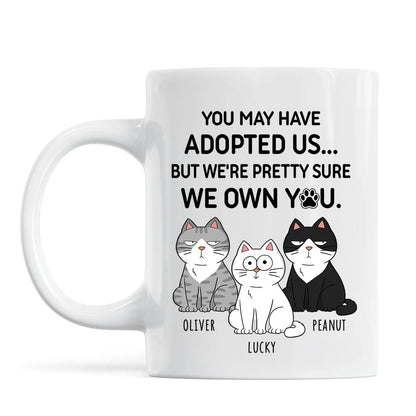 You May Have Adopted Us... But We Own You Personalized Cat Lover White Ceramic Mug