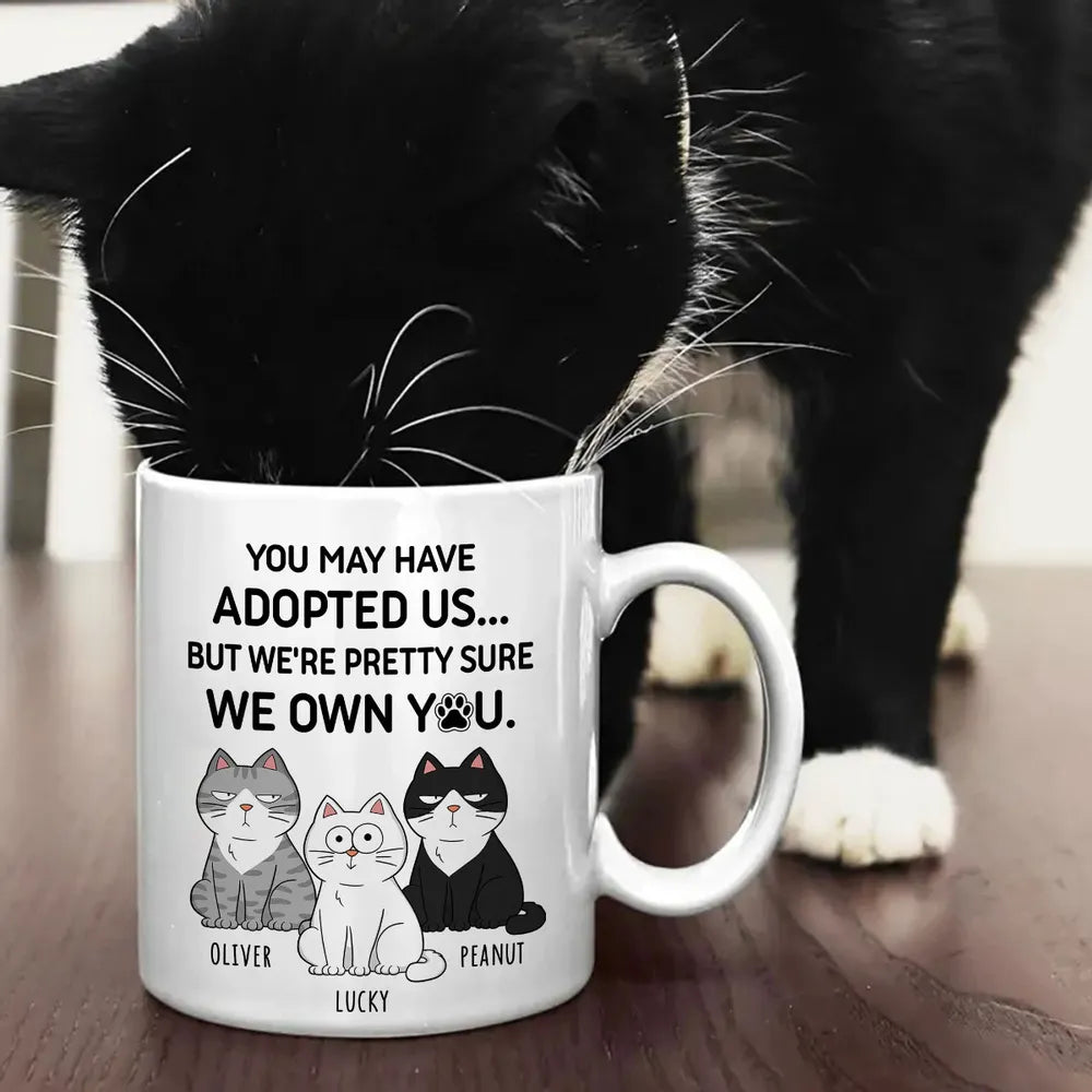 You May Have Adopted Us... But We Own You Personalized Cat Lover White Ceramic Mug