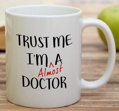 Trust Me I'm Almost a Doctor Funny Coffee Mug, Medical Student Gift for Medics Nurses Doctors, Graduation Birthday Gift for Friends Coworkers