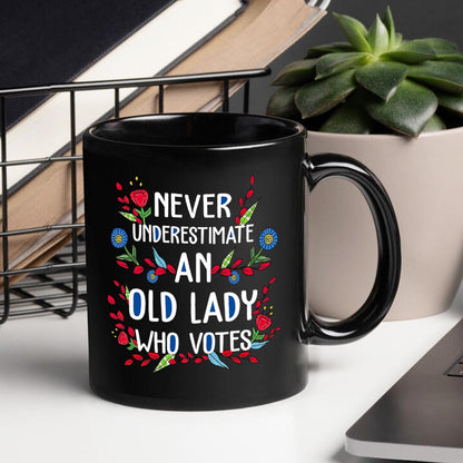 Never Underestimate An Old Lady Who Votes Mug