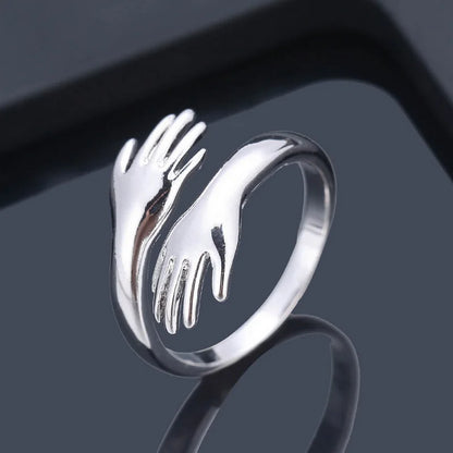 Adjustable Hug Hands Couple Ring in Silver Tone
