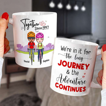 We're In It For The Long Journey & The Adventure Continues, Couple Cycling White Mug